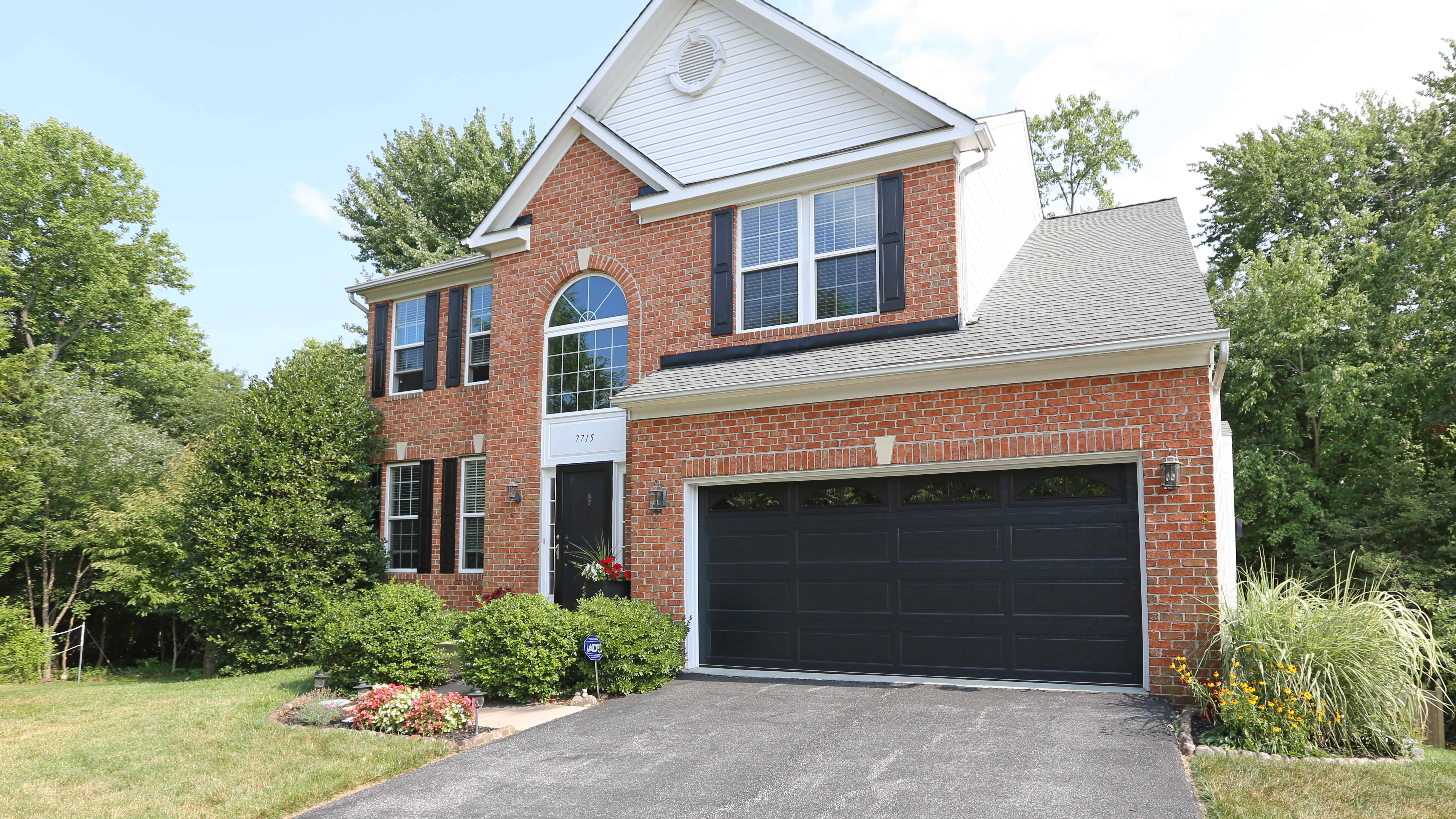 Insulated Thermacore Garage Door | Black Long Panel Design